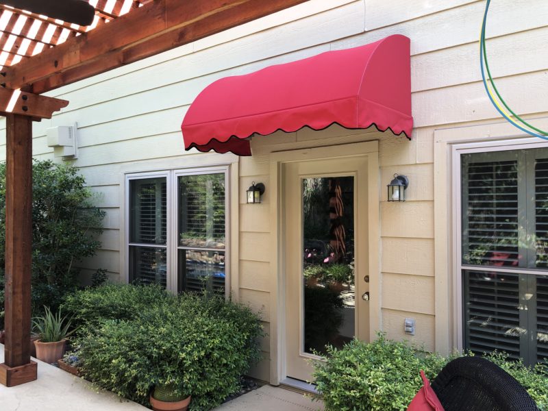Convex fabric awning with scalloped valence Austin American Awning